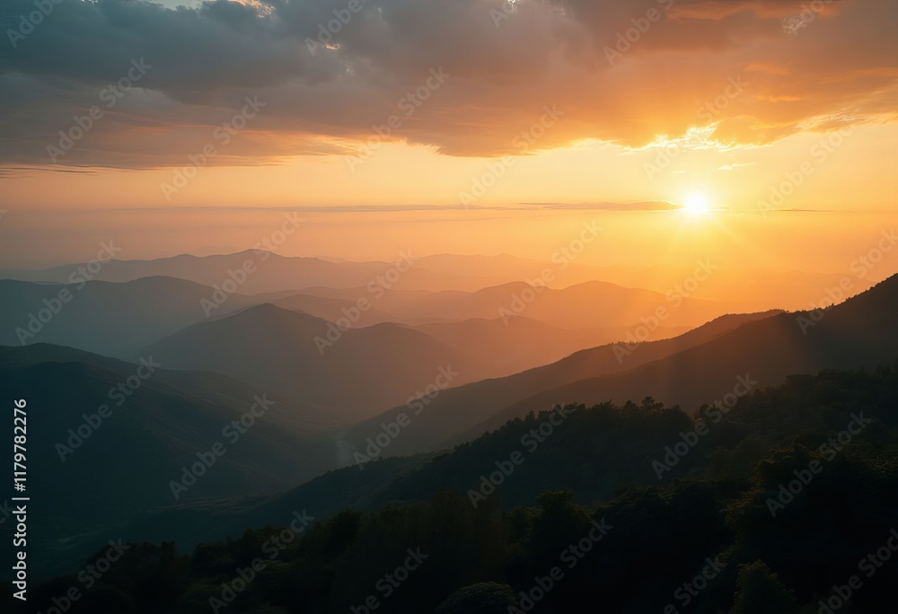 Sunset over mountain range with trees and clouds Sunset over mountain range with trees and clouds