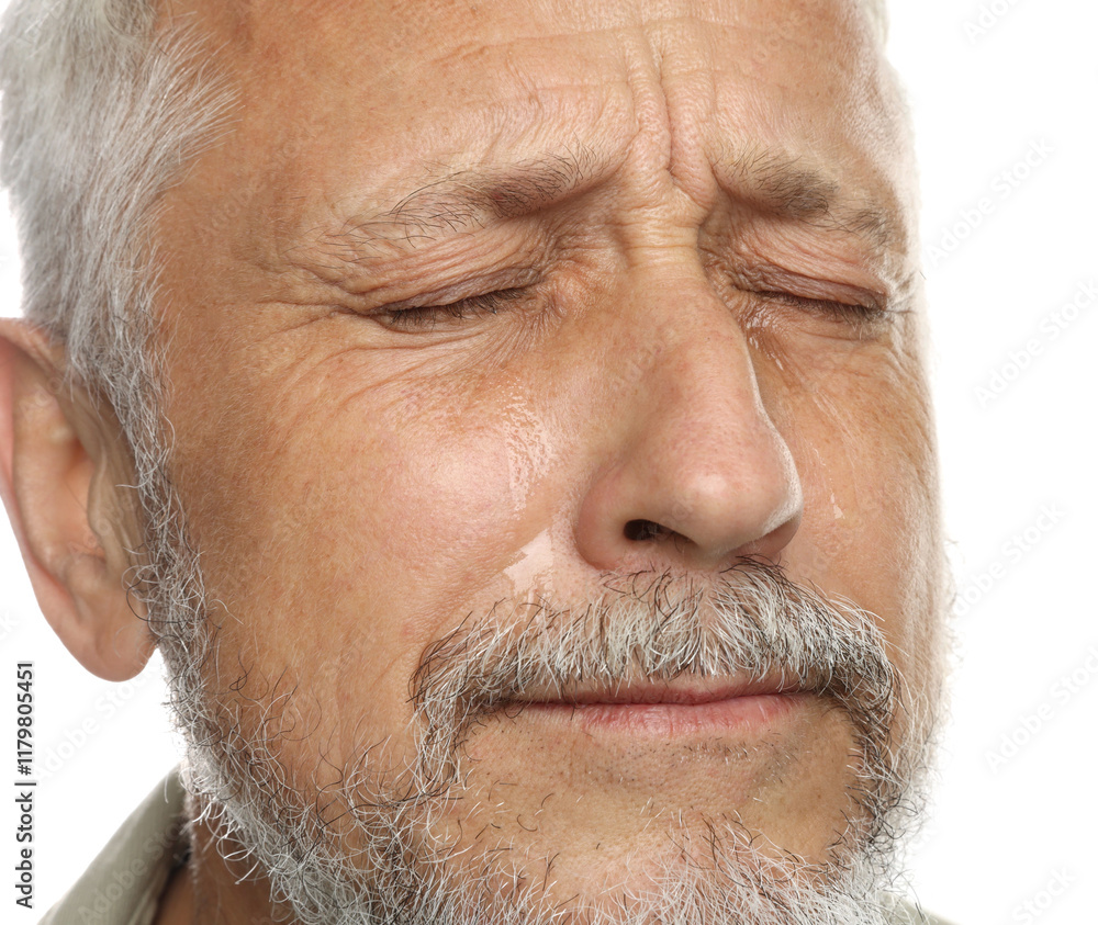Sad senior man crying on white background, closeup Sad senior man crying on white background, closeup
