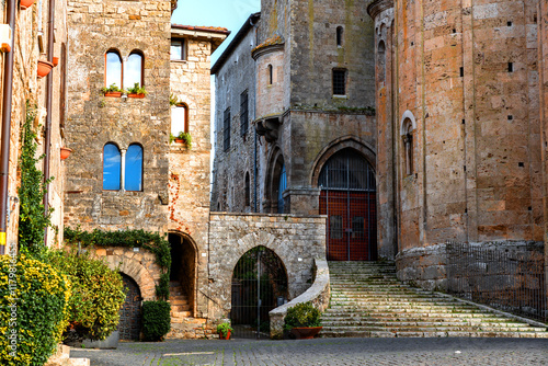 Foto Anagni in Ciociaria with stone buildings and the staircase leading to the rear f