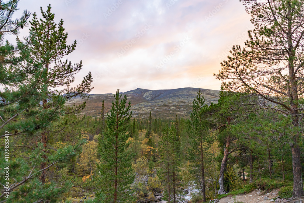 View to Khibiny mountains near Chasnayok creek. Early autumn in arctic tundra region. Kola peninsula, Murmansk region, Russia.