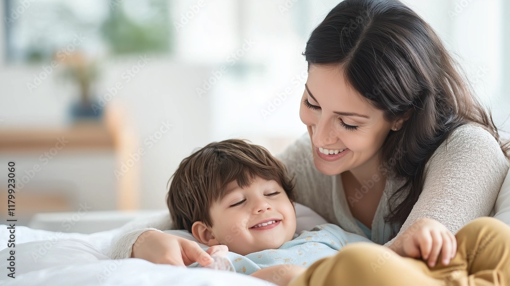 smiling mother tucking their child into bed, telling him bedtime stories smiling mother tucking their child into bed, telling him bedtime stories