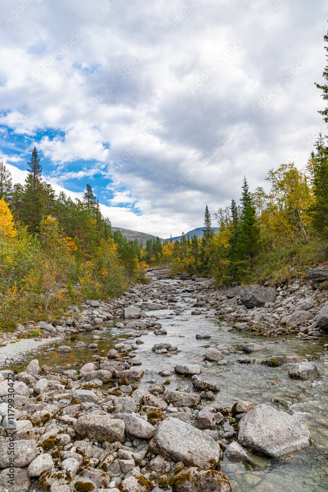 View to Mannepakhp river at Khibiny mountains. Early autumn in arctic tundra region. Kola peninsula, Murmansk region, Russia.