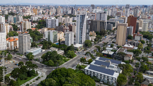 Drone view of the central region of Curitiba, capital of the state of Paraná, on a sunny day. Below on the right is the city hall of the capital