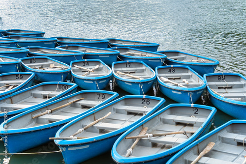 Wallpaper Mural Blue boats at the dock on Katsura river in Arashiyama district, Kyoto. Torontodigital.ca