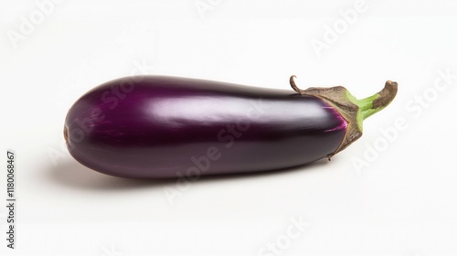 long curved purple eggplant on bright studio background featuring glossy texture calm still life copyspace concept of grocery cooking diet business photo