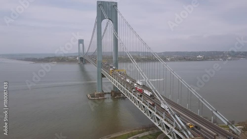 NEW YORK, USA - JANUARY 5, 2025: Heavy traffic crosses the Verrazzano Narrows Bridge in New York City during peak hours photo