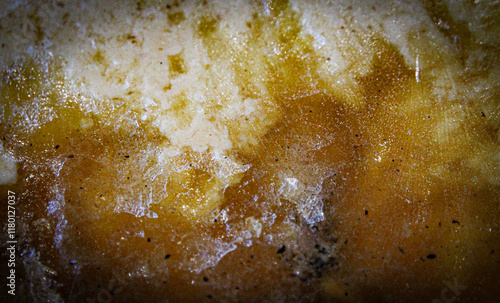 macro close-up of solid cooking fat with congealed lumps of greases and other liquids with copyspace for design projects backdrop