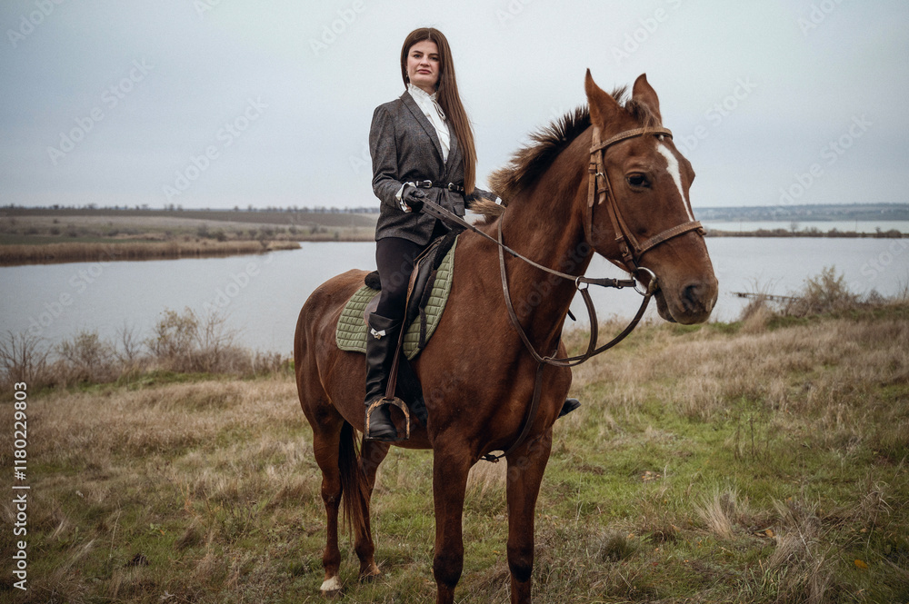 A person riding a horse in a field A person riding a horse in a field