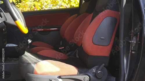 Black sports seats with red inserts inside car