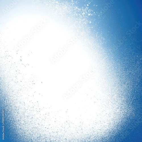 A person rides a snowboard down a snow-covered hill, with plenty of white space around