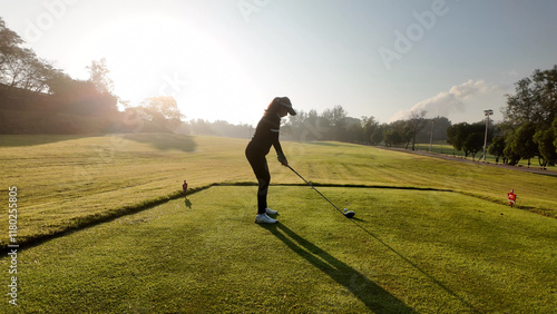 Obraz na płótnie Woman playing golf on beautiful course , swinging and hitting golf ball , luxury vacation w salonie