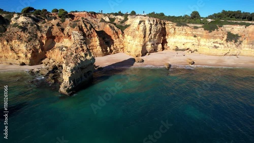  Best scenic becahes of Algarve coast, Portugal. Breathtaking scenic rocks of Praia da Marinha. Aerial drone 4k hd video.