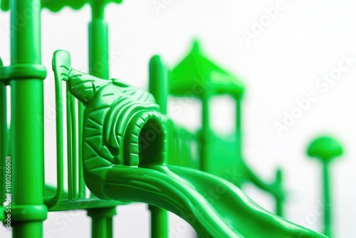 Fototapeta Naklejka Na Ścianę i Meble -  A close-up shot of a green plastic water slide, ideal for summer fun and kids' parties
