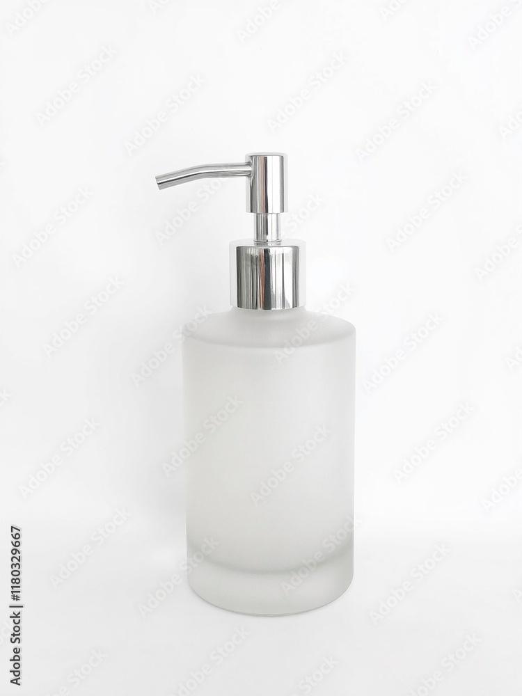 A single frosted glass pump dispenser with a metallic silver pump, set on a clean white background A single frosted glass pump dispenser with a metallic silver pump, set on a clean white background