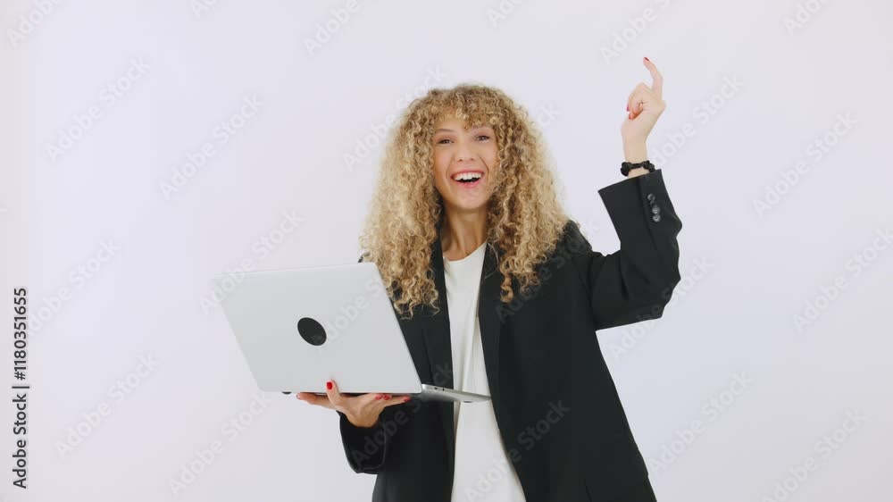 A professional woman focused on her laptop while actively engaging in a modern workspace, showcasing dedication to her career and productivity A professional woman focused on her laptop while actively engaging in a modern workspace, showcasing dedication to her career and productivity