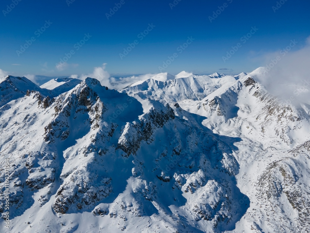 Obraz premium Winter view of Pirin Mountain near Polezhan and Bezbog Peaks, Bulgaria