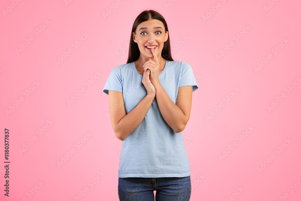 Anticipation And Expectation Concept. Portrait Of Emotional Smiling Young Lady Waiting For Something, Amazed Impressed Woman Looking At Camera, Standing And Posing Over Yellow Studio Background Anticipation And Expectation Concept. Portrait Of Emotional Smiling Young Lady Waiting For Something, Amazed Impressed Woman Looking At Camera, Standing And Posing Over Yellow Studio Background
