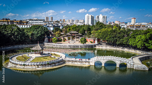 Photography Confucius temple in Jianshui with pond and bridge. Yunnan, China