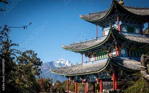 Black Dragon Lake temple with Holy Naxi mountain. Lijiang, Yunnan, China. photo