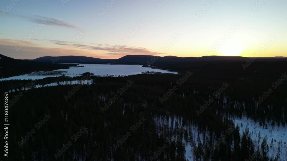 Aerial view of winter landscapes with snow-covered forest in Finland Aerial view of winter landscapes with snow-covered forest in Finland