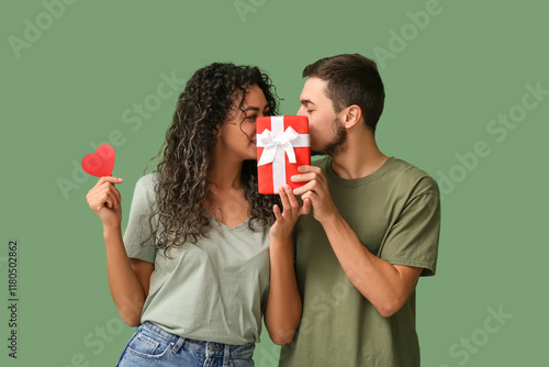 Young couple with paper hea...