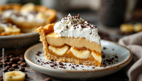 Wallpaper Mural Slice of banoffee pie with creamy layers, garnished with chocolate, in a cozy setting. Torontodigital.ca