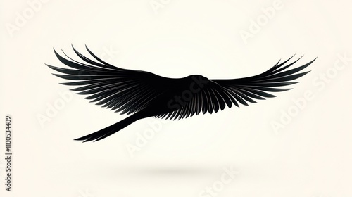 Black bird silhouette in flight, wings spread wide. photo