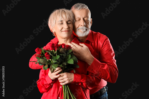 Happy mature couple with bo...