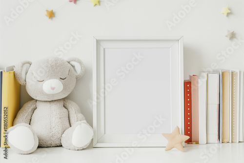 Blank picture frame leaning against wall with teddy bear