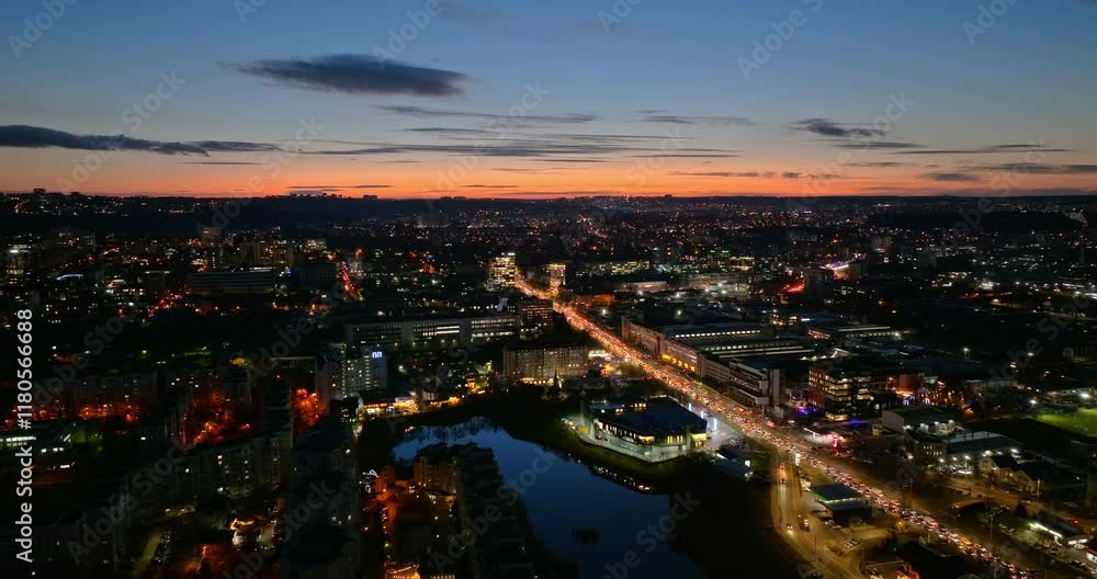 Aerial drone view of cars in traffic at a roundabout in Chisinau, Moldova at sunset Aerial drone view of cars in traffic at a roundabout in Chisinau, Moldova at sunset