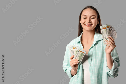 Young woman with dollar ban...