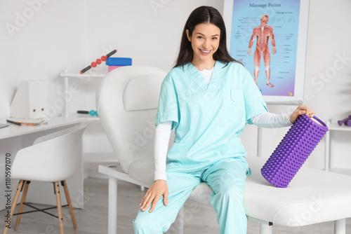 Female physiotherapist with...