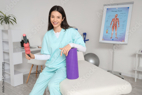Female physiotherapist with...