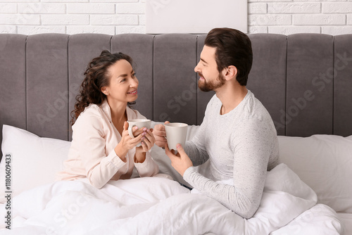 Happy couple enjoying morni...