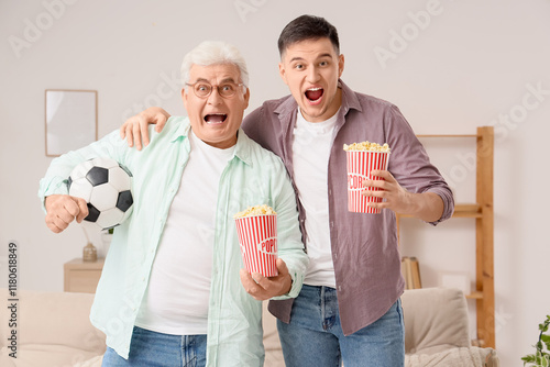 Young man and his father wi...