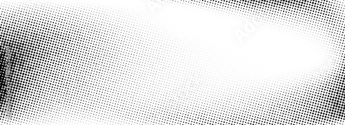 Aged halftone gradient background. Faded dotted grit noise texture. Black and white rasterized sand wallpaper. Retro pixelated backdrop. Anime or manga style comic grain overlay. Vector grunge bitmap