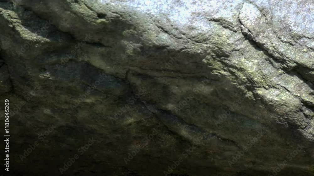 Shadow of sparkling water light on a large rock. Abstract texture background. Raw video real time no edit. Footage 4K, 60Fps Shadow of sparkling water light on a large rock. Abstract texture background. Raw video real time no edit. Footage 4K, 60Fps