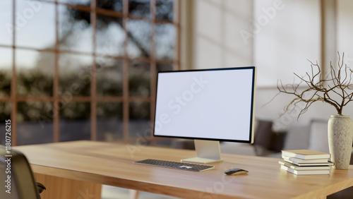 Wallpaper Mural A close-up of a computer on a wooden table, set in a cozy Scandinavian room. Torontodigital.ca
