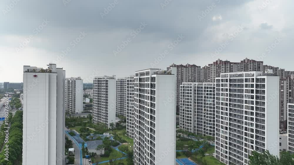 Aerial view of new residential neighborhood showcasing modern architecture in urban setting Aerial view of new residential neighborhood showcasing modern architecture in urban setting