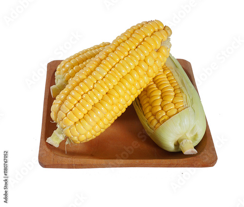 Isolated set of corn in wooden plate on transparent background photo