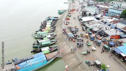 Charming Riverside Local Market with Boats in Kishoreganj, Bangladesh photo