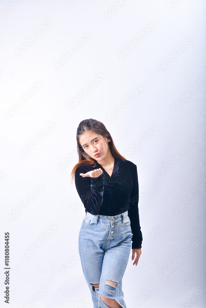 Smiling Woman in Casual Outfit Isolated Against a Bright White Background Smiling Woman in Casual Outfit Isolated Against a Bright White Background