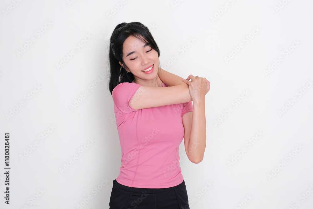 A woman wearing sportswear doing hand stretching A woman wearing sportswear doing hand stretching