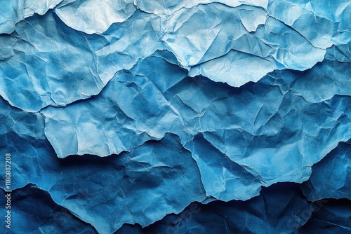 Wallpaper Mural Crumpled blue paper texture creating an abstract background in various shades for creative design Torontodigital.ca