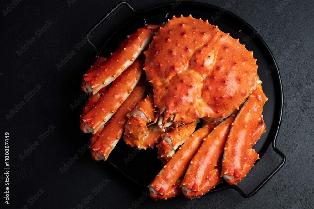 Gourmet Kamchatka Crab on Black Table. Healthy food concept. A hand-taken photo, not an AI Gourmet Kamchatka Crab on Black Table. Healthy food concept. A hand-taken photo, not an AI