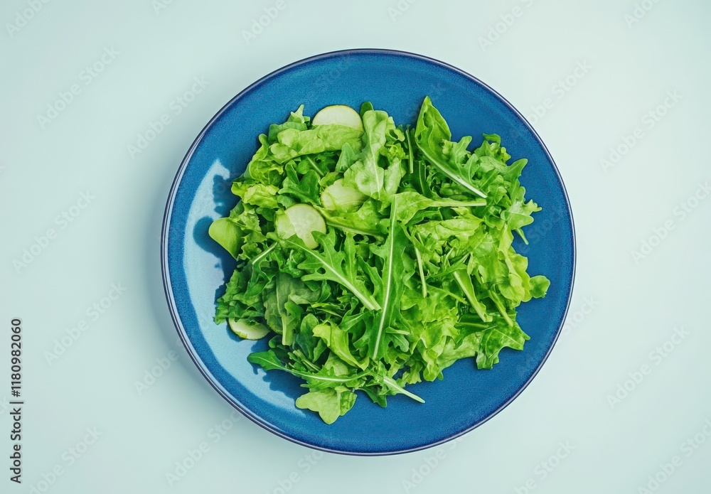 Fresh and Healthy Leafy Green Salad Served in a Blue Bowl, Perfect for Nutritious Meals and Wholesome Eating, Ideal for Health-Conscious Individuals and Clean Eating Enthusiasts Fresh and Healthy Leafy Green Salad Served in a Blue Bowl, Perfect for Nutritious Meals and Wholesome Eating, Ideal for Health-Conscious Individuals and Clean Eating Enthusiasts
