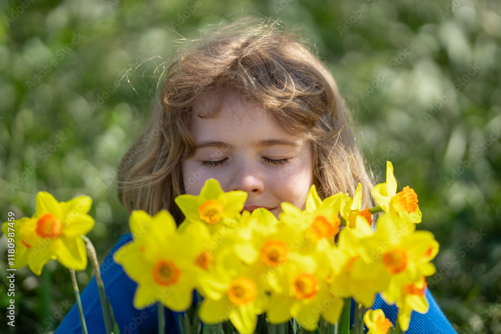 Spring fun for kids. Child play outdoors in a beautiful spring garden. Kid face in flowers. Adorable little kid in blooming cherry garden on beautiful spring day. Happy child during spring blossom. Spring fun for kids. Child play outdoors in a beautiful spring garden. Kid face in flowers. Adorable little kid in blooming cherry garden on beautiful spring day. Happy child during spring blossom.