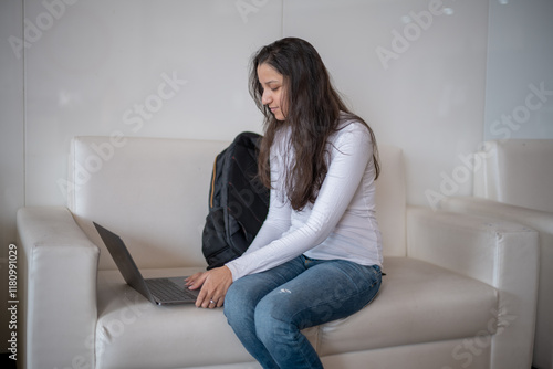 Free Download Woman using laptop computer, working at home. Casual business, freelance work, distance studying, internet marketing, meeting online concept - GFXLoad