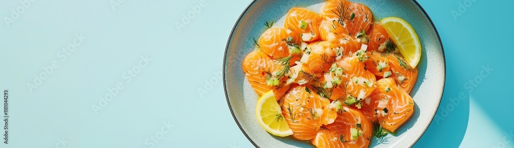 Fresh Salmon Slices with Lemon and Dill on Plate, Vibrant Blue Background, Healthy Seafood Dish, Gourmet Presentation, copy space for text Fresh Salmon Slices with Lemon and Dill on Plate, Vibrant Blue Background, Healthy Seafood Dish, Gourmet Presentation, copy space for text