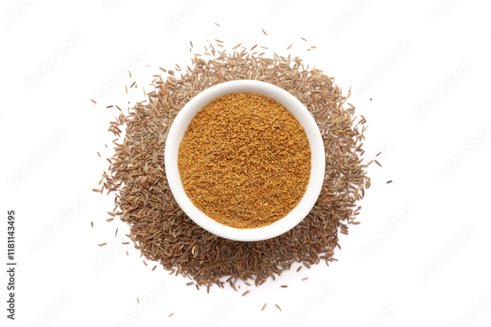 A bowl of Organic Caraway seeds (Carum carvi) powder, placed over a heap of whole Caraway seeds. Isolated on a white background. A bowl of Organic Caraway seeds (Carum carvi) powder, placed over a heap of whole Caraway seeds. Isolated on a white background.